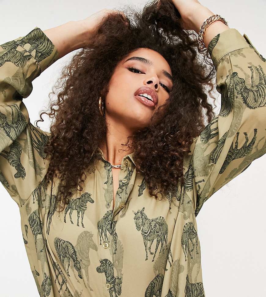 Plus-size shirt by ASOS DESIGN Big print energy All-over zebra print Spread collar Button placket Drop shoulders Button cuffs Relaxed fit Slouchy cut