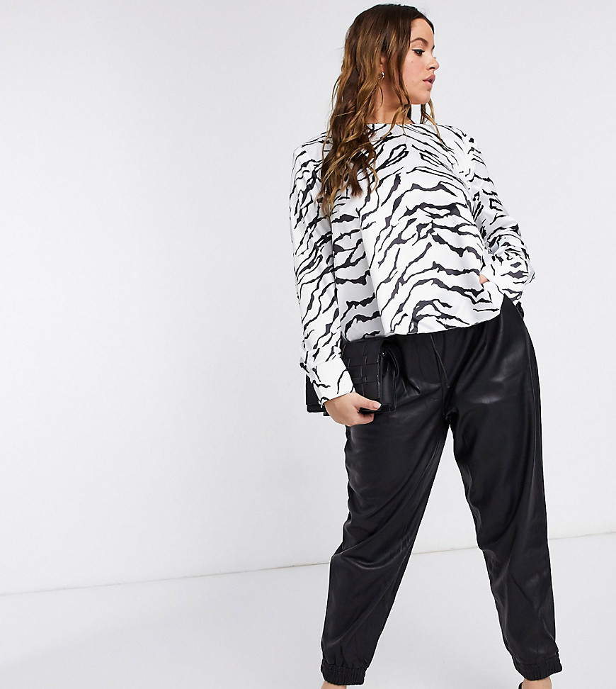 ASOS DESIGN Curve long sleeve top with shoulder pads in zebra print-Multi