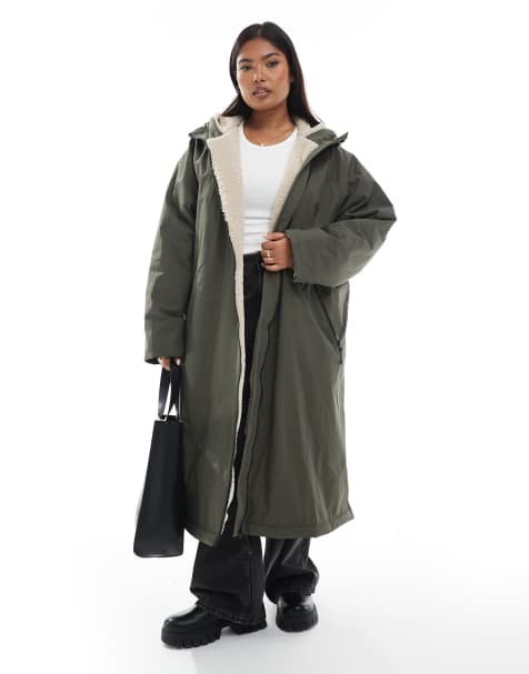 ASOS DESIGN Curve – Longline-Regenmantel in Olivgrün mit Fleecefutter - view 1