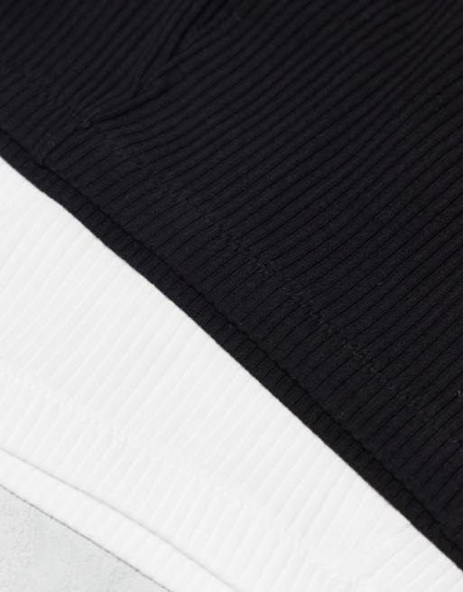 ASOS DESIGN Curve - Lot de 2 brassières courtes côtelées en dentelle - Noir et blanc, 3 de 4