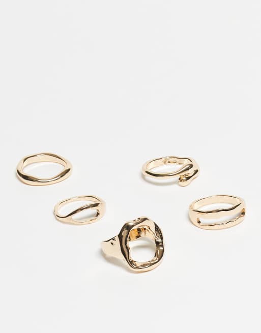 ASOS DESIGN Curve - Lot de bagues sculpturales variées effet fondu - Doré