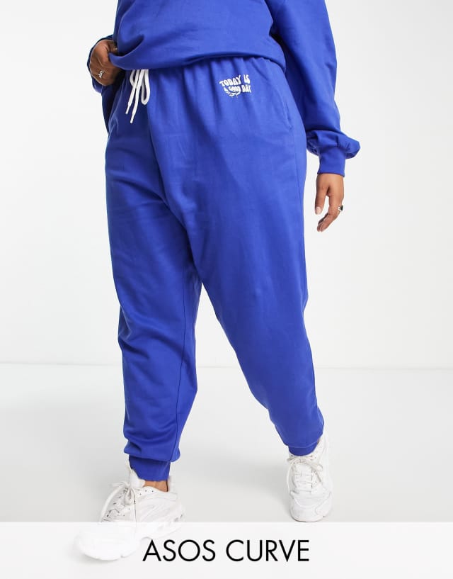 ASOS DESIGN Curve lounge 'Good Day' sweatpants in blue - part of a set