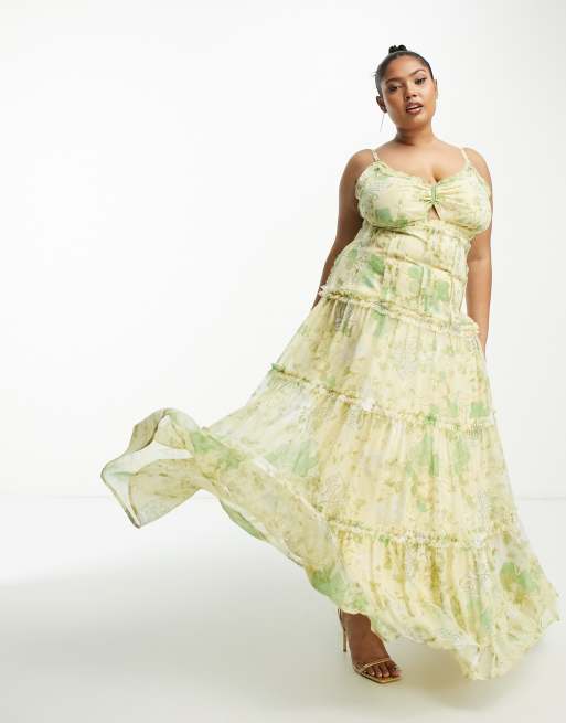 ASOS DESIGN Curve - Maxi slipdress met geknoopte voorkant, uitsnijding en stroken met onafgewerkte randen in geel met bloemenprint
