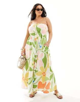 ASOS DESIGN Curve - Maxi-Sommerkleid mit geraffter Brustpartie, verstellbaren Trägern und abstraktem, buntem Blumenmuste...