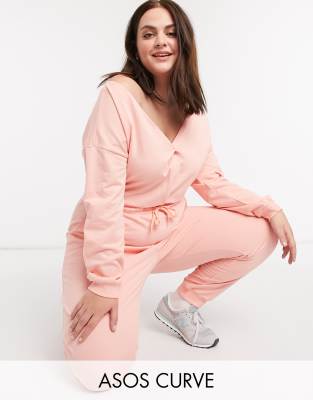 ASOS DESIGN Curve – Melanżowy kombinezon domowy z odkrytymi ramionami z dżerseju w kolorze bladoróżowym