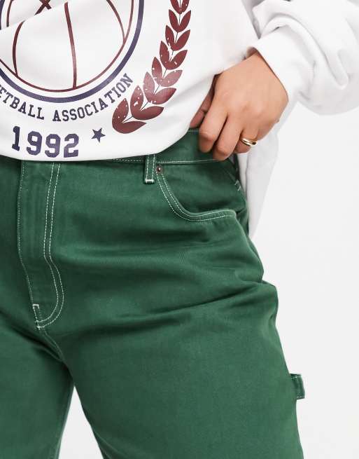ASOS DESIGN Curve mid rise oversized 'skater' jean in racing green with contrast white thread, 3 of 4