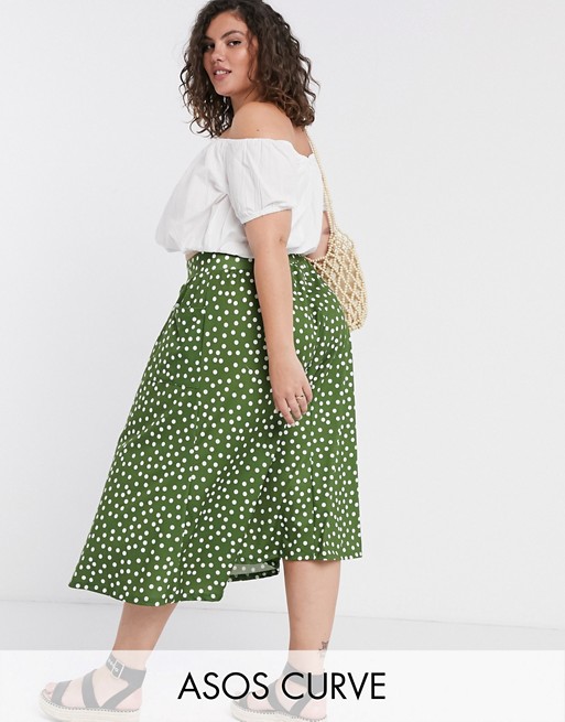 ASOS DESIGN Curve midi skirt with pockets in khaki spot print