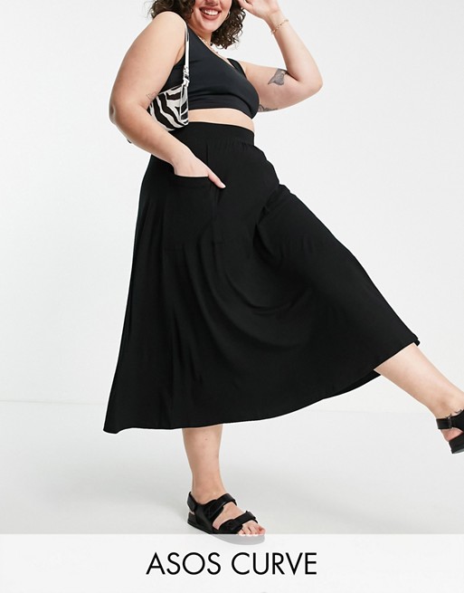 ASOS DESIGN Curve midi skirt with pockets in black