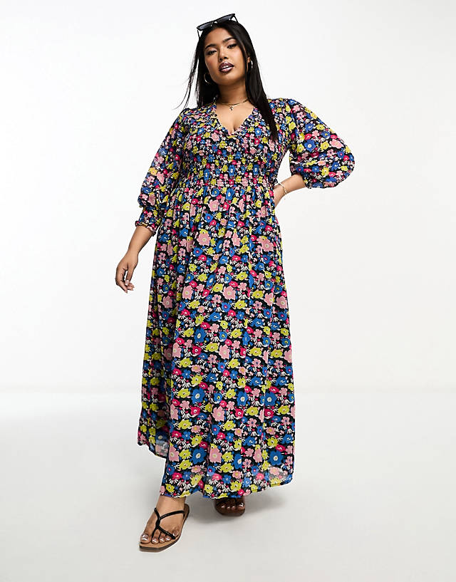 ASOS Curve - ASOS DESIGN Curve midi smock dress with shirred cuffs in black based multi floral print