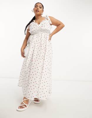 ASOS DESIGN Curve - Midi-Sommerkleid mit braunen Punkten, gesmokter Taille und Brustpartie im Schleifendesign-Bunt