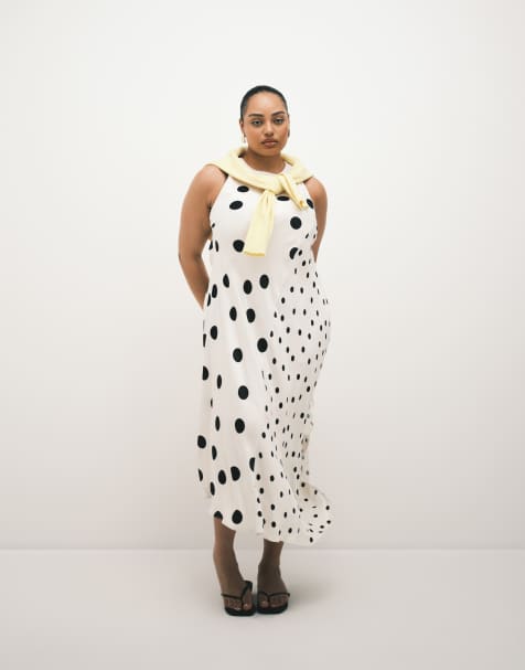 ASOS DESIGN Curve – Midikleid in Schwarz mit asymmetrischem Saum, Ringerrücken und Punktemustermix - view 1