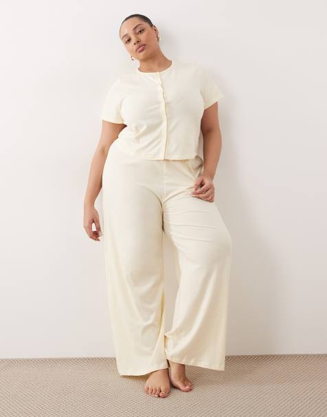 ASOS DESIGN Curve – Mieszaj i łącz – Kremowożółte bawełniane spodnie od piżamy - view 1