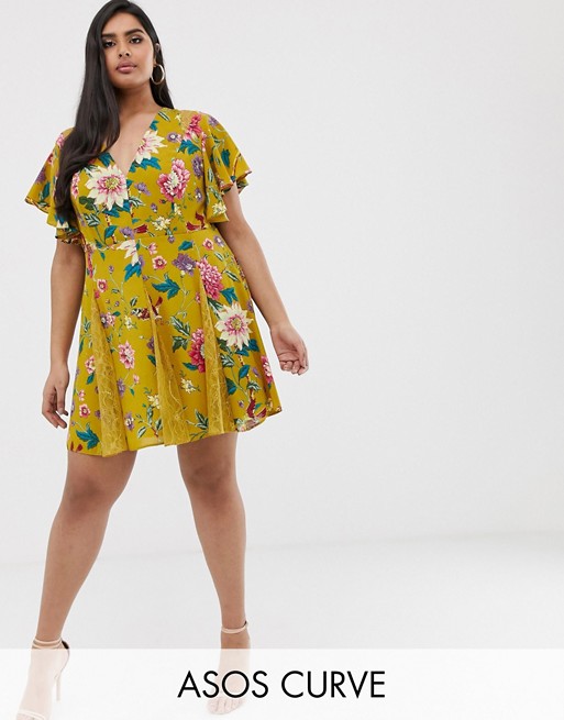 ASOS DESIGN Curve mini dress with godet lace inserts in floral bird print