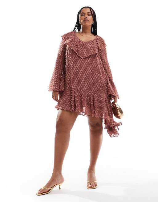 ASOS DESIGN Curve - Mini jurk van dobbystof met V-hals en asymmetrische zoom in roze