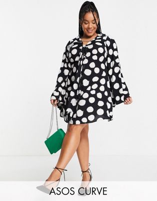 ASOS DESIGN Curve mini shirt dress with tie front and flared sleeve in spot print