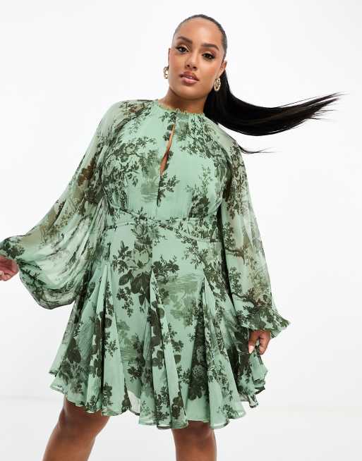 ASOS DESIGN Curve - Mini skaterjurk met lange mouwen, kanten inzetstuk en bloemenprint in groen
