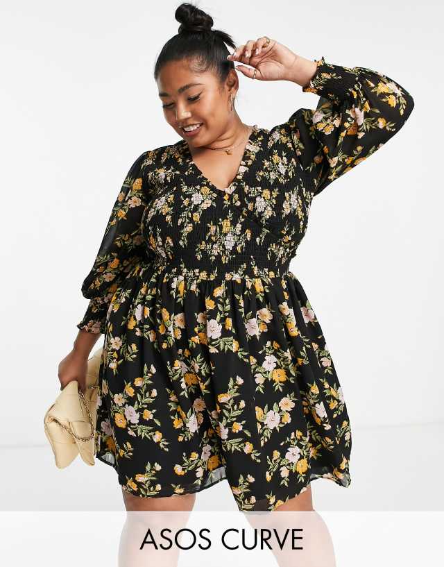 ASOS DESIGN Curve mini smock dress with shirred cuffs in black base orange floral print