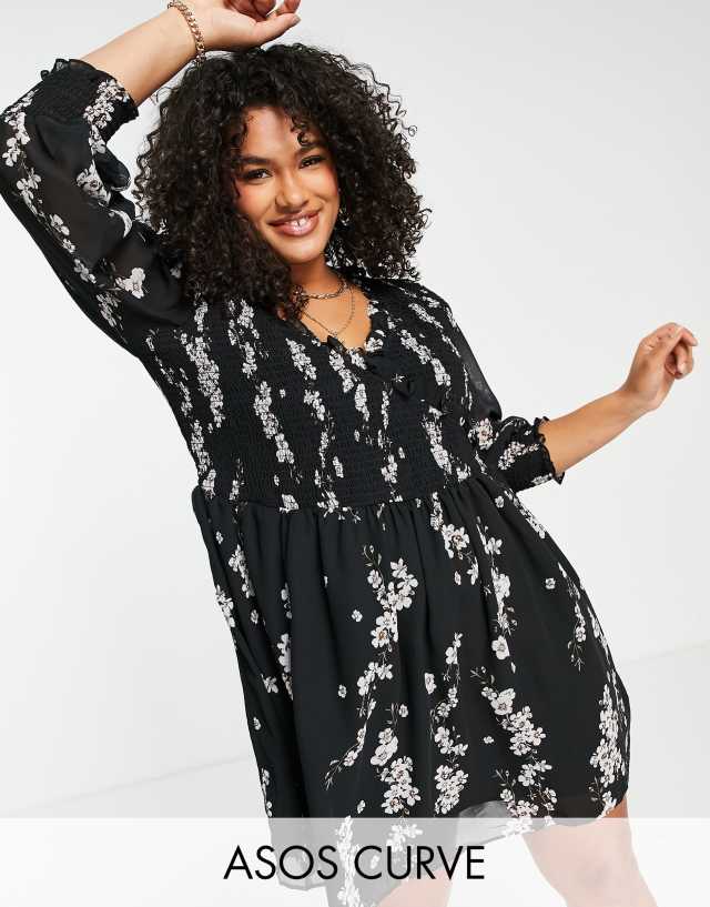 ASOS DESIGN Curve mini smock dress with shirred cuffs in black floral print