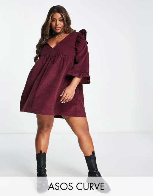 ASOS DESIGN Curve - Mini-smockjurk van corduroy met ruches op de schouder in donker bessenrood