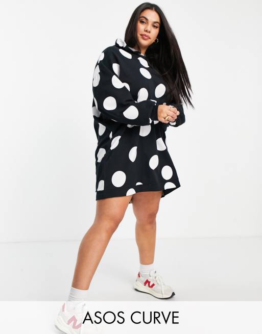 ASOS DESIGN Curve - Mini sweaterjurk met capuchon en grote stippenprint in zwart en wit