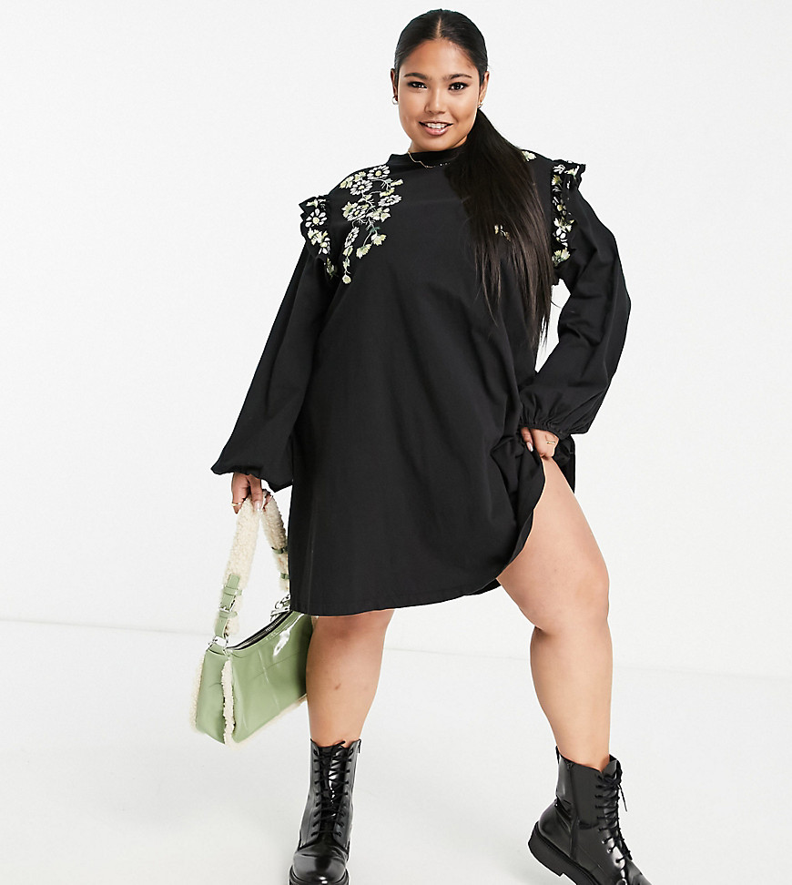 Asos Design Curve Mini Swing Dress With Shoulder Ruffle And Daisy Embroidery In Black