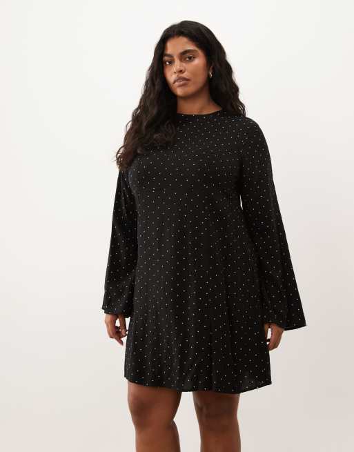 ASOS DESIGN Curve miniklänning med långa ärmar i svartvitt prickmönster, 3 av 4