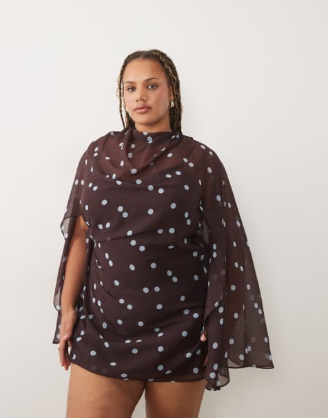 ASOS DESIGN Curve Minikleid mit hohem Kragen, Drapierung vorn und extremen Cape-Ärmeln in Braun mit Polka-Dot-Muster - view 1
