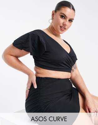 ASOS DESIGN Curve - Mix and Match - Bikinioberteil in Schwarz mit Wickeldesign und Flügelärmeln