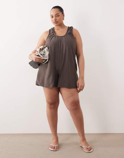 ASOS DESIGN Curve – Mörkgrå playsuit med djup halsringning och smock - view 1