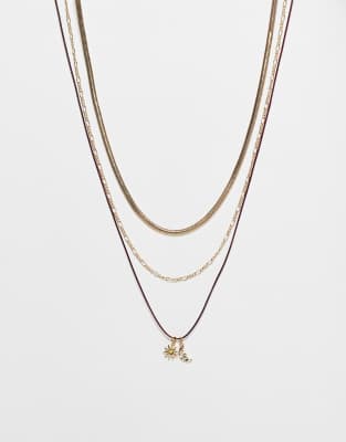 ASOS Curve ASOS DESIGN Curve multi-pack necklaces in cord and chain mix with gold-tone celestial charms