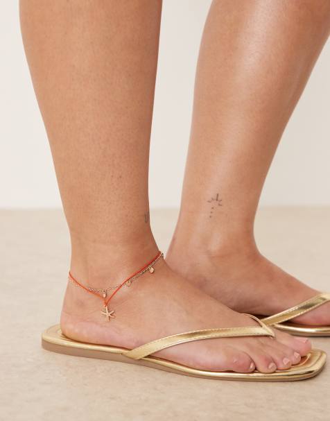 ASOS DESIGN Curve multi row anklet with starfish in orange and gold tone - view 1