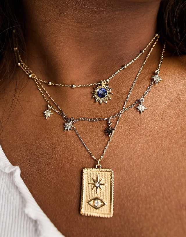 ASOS DESIGN Curve multirow necklace with celestial and vintage pendant in gold tone