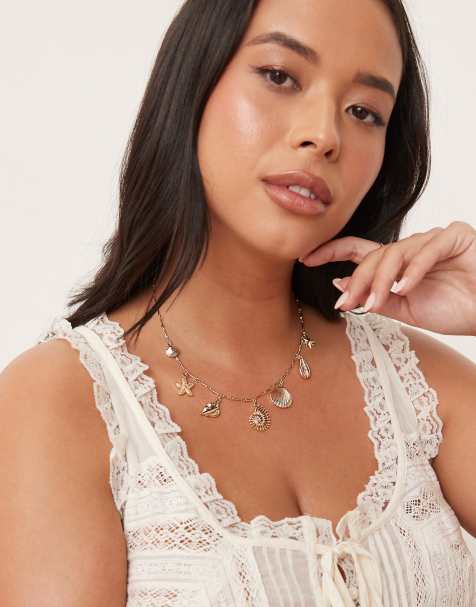ASOS DESIGN Curve – Naszyjnik w odcieniu złotym z zawieszkami z morskimi motywami - view 1