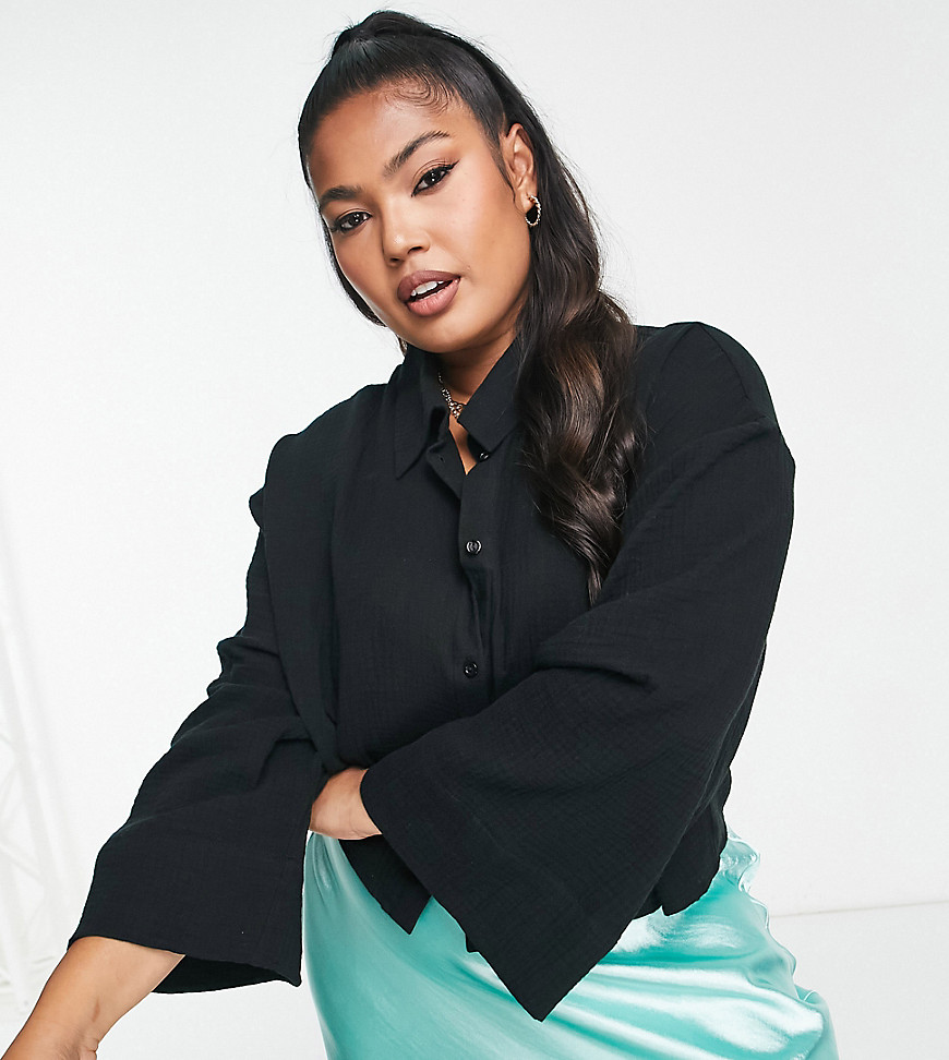 Tops by ASOS Curve Next stop: checkout Spread collar Button placket Flared sleeves Regular fit