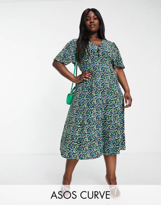 ASOS DESIGN Curve - Nette midi-jurk met knoopsluiting, gestrikte achterkant en uitlopende mouwen in zwarte bloemenprint