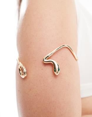 ASOS DESIGN Curve – Oberarm-Reif in Goldoptik mit Schlangendesign im Wickel-Design