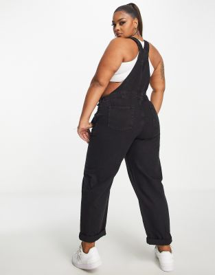 ASOS DESIGN Curve - 'Originele' denim tuinbroek in zwart met wassing | ASOS