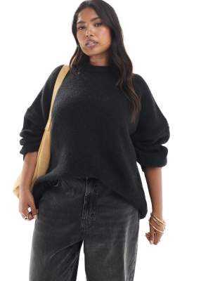 ASOS DESIGN Curve - Oversize-Pullover in Schwarz mit Rundhalsausschnitt und geschwungenem Saum
