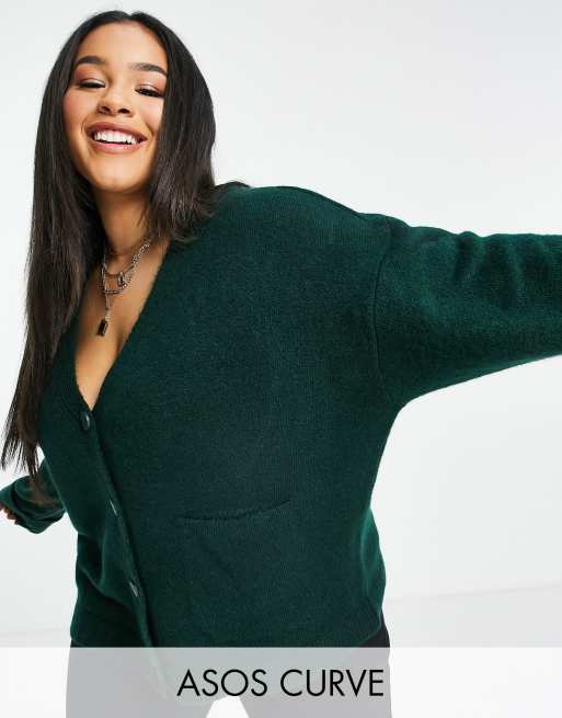 ASOS DESIGN Curve – Oversize-Strickjacke in Grün mit umgeschlagenen Bündchen und Taschen