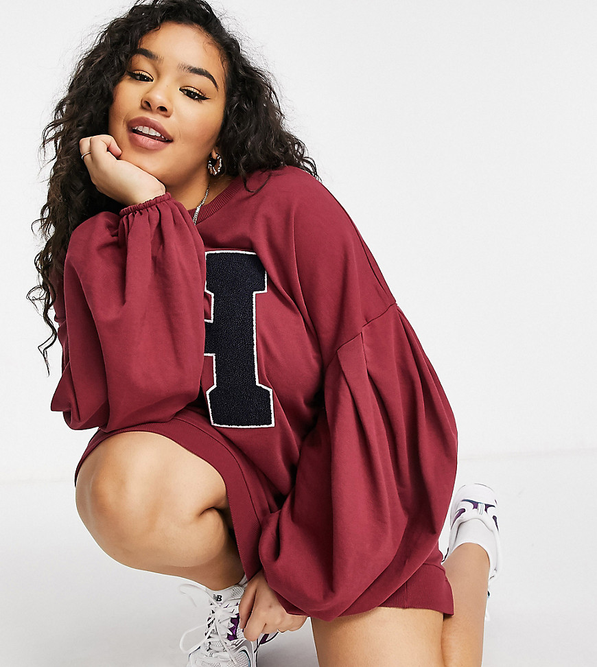 ASOS DESIGN Curve oversized balloon sleeve sweat mini dress with letter graphic in burgundy and navy-Red