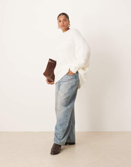 ASOS DESIGN Curve oversized boucle sweater with curved hem in cream