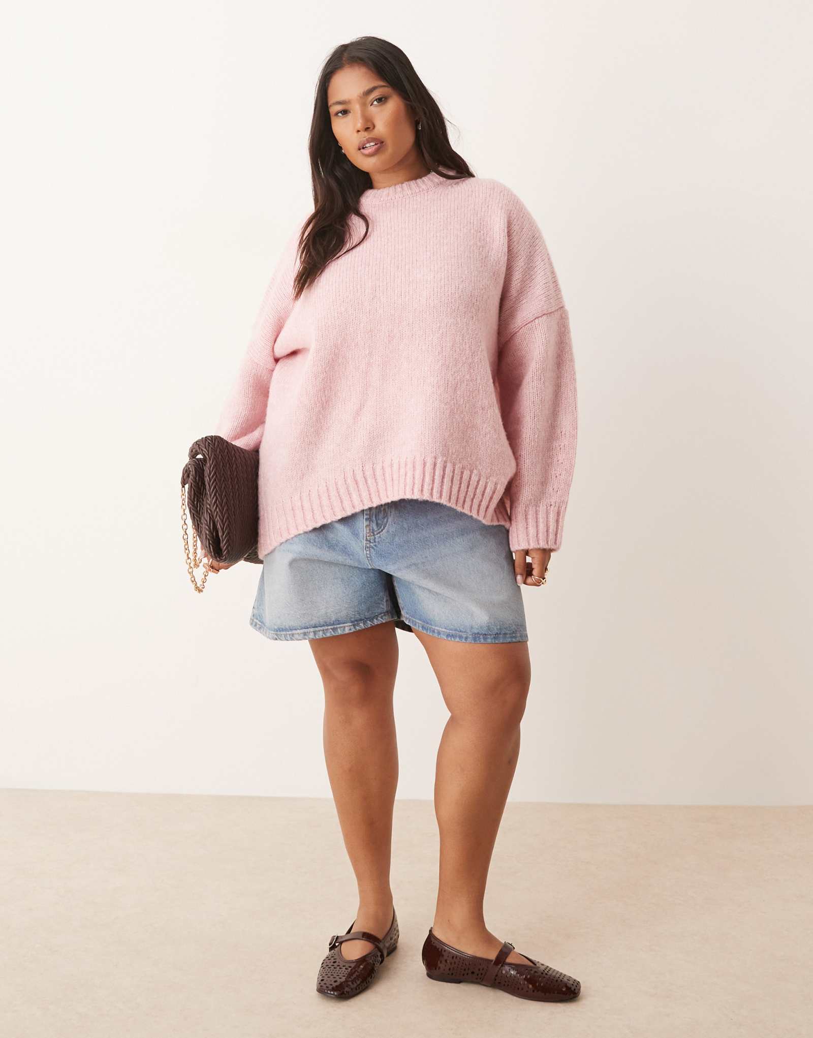Свитер ASOS DESIGN Curve оверсайз с круглым вырезом и закругленным низом розового цвета