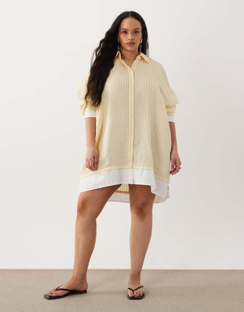 asos plus size shirt dress ASOS DESIGN Curve button through waist midi shirt dress in black