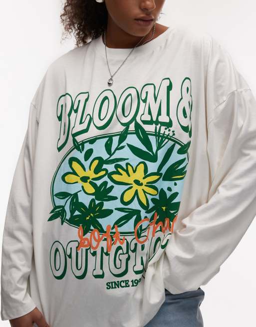 ASOS DESIGN Curve oversized long sleeve skater tee with flower bloom graphic in cream