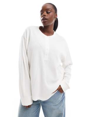 ASOS DESIGN Curve oversized long sleeve waffle knit henley top in cream-White