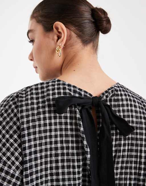 ASOS DESIGN Curve - Oversized peplum top met korte mouwen in zwarte ruit, 3 van 4