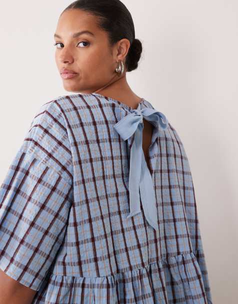 ASOS DESIGN Curve oversized short sleeve peplum top in blue check - view 1