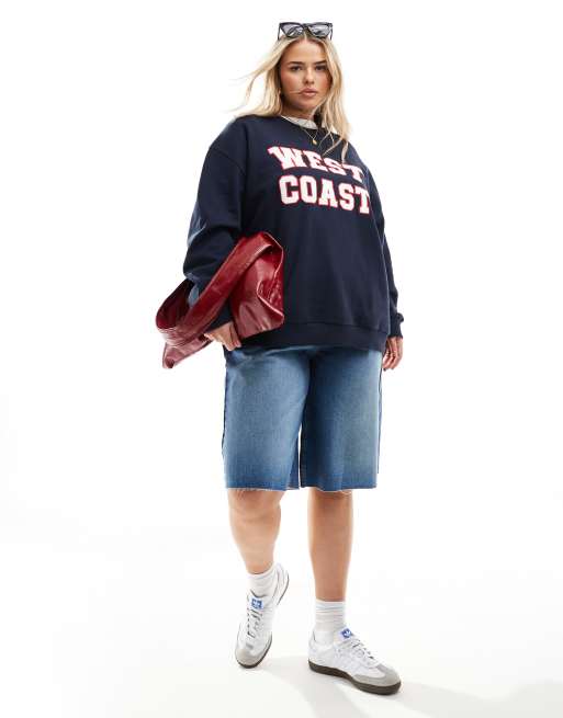 ASOS DESIGN Curve oversized sweat with west coast applique graphic in navy ASOS