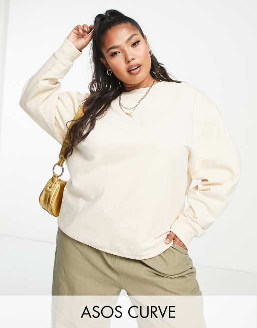 ASOS DESIGN oversized sweatshirt with raw hem in cream