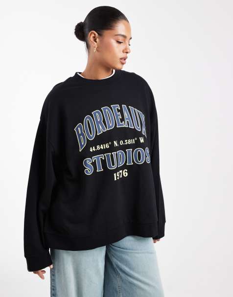 ASOS DESIGN Curve oversized sweatshirt with bordeaux studios graphic in black - view 1